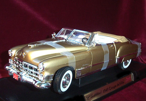 1949 Cadillac Coupe de Ville - Gold (YatMing) 1/18